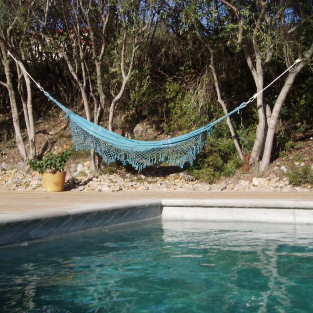la-poussada-piscine-jardins-07 Repos dans le hamac, la Poussada